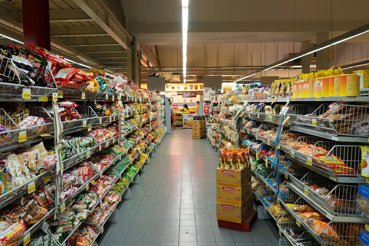 An Asian grocery aisle stocked with packaged goods
